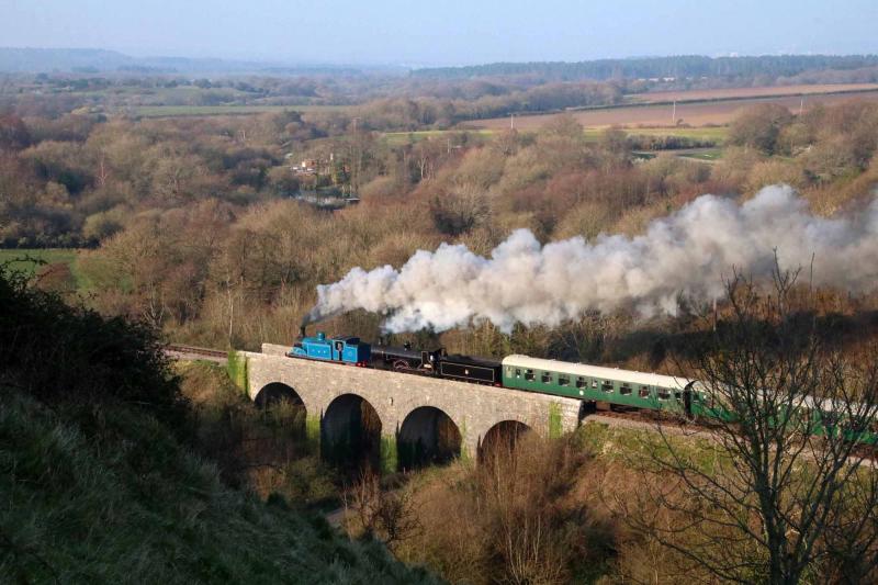 Corfe Viaduct: 419 and 30120 cross the four arch viaduct over the Studland road between Corfe and Norden stations. Photo by Andrew P.M. Wright Photo of Corfe Viaduct