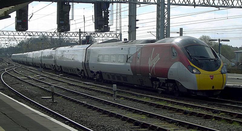 390129 at Carlisle: Wearing the new Virgin Livery. Pendolino 11 car 390129 arrives at Carlisle, with a service from London Euston to Glasgow Central on Saturday 6th April 2019. Photo of 390129 at Carlisle