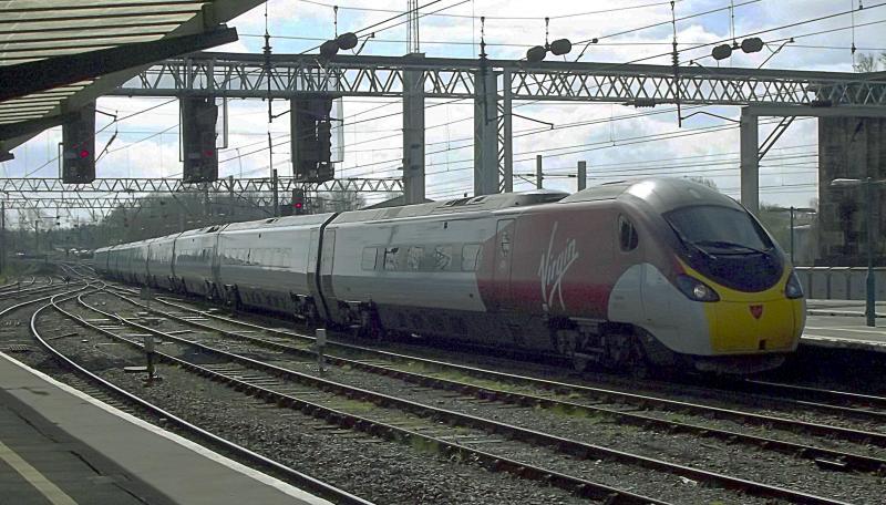 390049 at Carlisle: Wearing the new Virgin Livery. Pendolino 9 car 390049 arrives at Carlisle, with a service from London Euston to Glasgow Central on Saturday 6th April 2019 Photo of 390049 at Carlisle