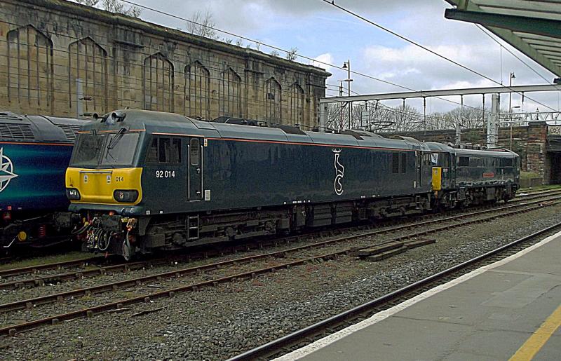 92014 at Carlisle: Wearing Caledonian Sleeper Livery, GBRf operated 92014 arrives at Carlisle with 0Z86,and 86101 on a staff training run on Saturday 6th April 2019. Photo of 92014 at Carlisle
