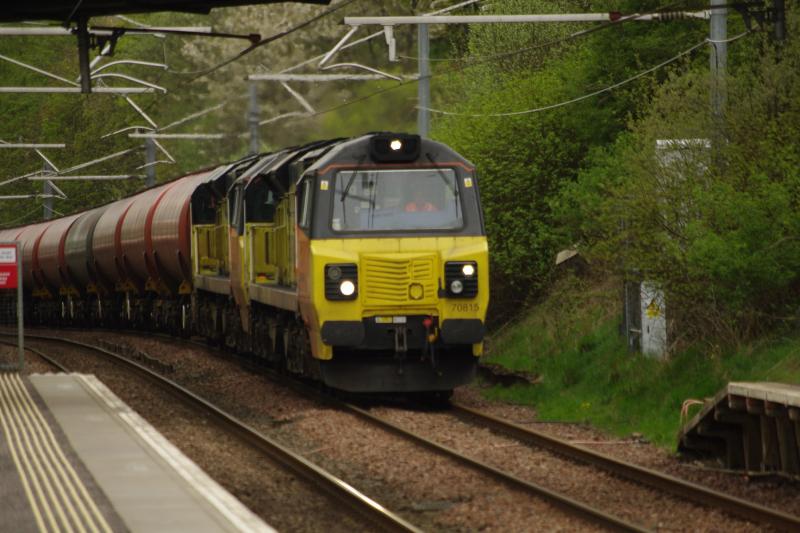 Cumbernauld Tanks: Colas 70815 and 814 lead the empty tanks from Carlisle NY to Grangemouth Ineos on 28-04-19, passing through Cumbernauld station. Photo of Cumbernauld Tanks