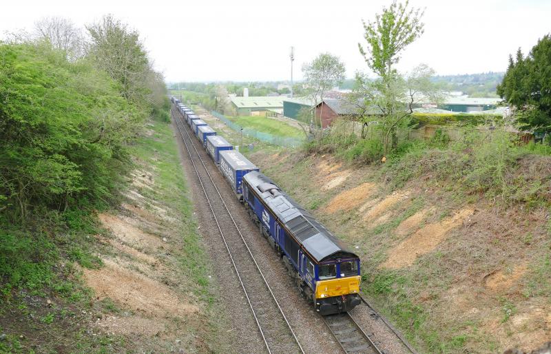 4D47 Inverness to Mossend departing Perth with 66302.: Note both sides of the track are nearly cleared of bushes and trees..30-4-19.. Photo of 4D47 Inverness to Mossend departing Perth with 66302.