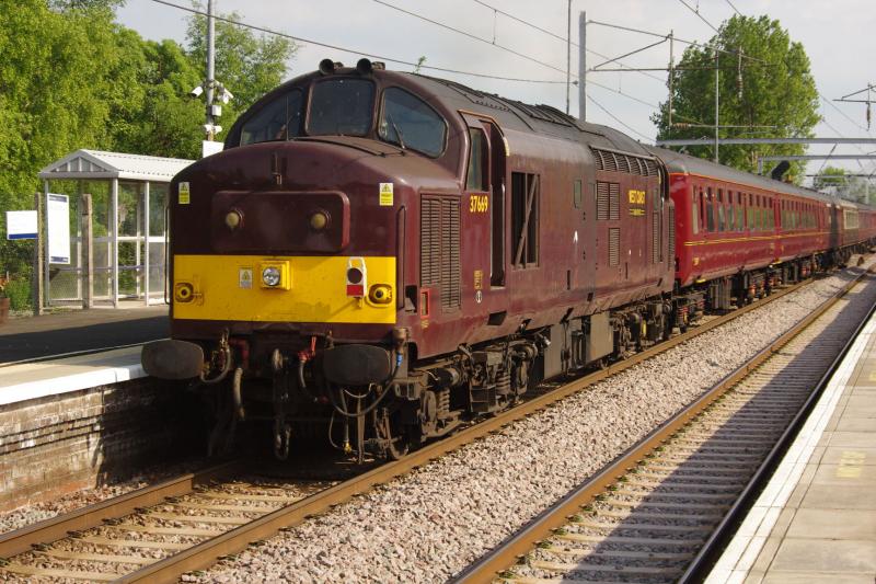 WCRC 37669 Coatbridge Central: Attached to the rear of the Steam Dreams railtour, 37669 gives a helpful shove on departure from Coatbridge Central. Photo of WCRC 37669 Coatbridge Central