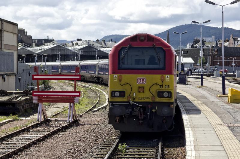 67015 INVERNESS 10.6.19.jpg: ON THE DAY I TOOK THIS THE LATEST SLEEPER COACHES WERE IN A SIDING AT INVERNESS SO IT CAN'T BE TOO LONG TILL THE STOCK BEHIND 67015 IS REPLACED Photo of 67015 INVERNESS 10.6.19.jpg
