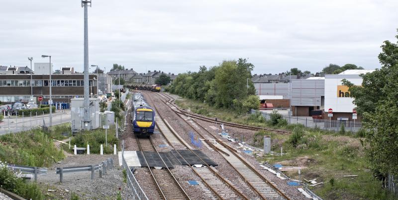 170411 HEADS FOR DYCE 26.6.19.jpg: 170411 PASSES THE SITE OF KITTYBREWSTER STN.AS IT HEADS FOR DYCE.
66035 IS ABOUT TO HEAD DOWN THE WATERLOO BRANCH WITH THE EMPTY TANKS. Photo of 170411 HEADS FOR DYCE 26.6.19.jpg