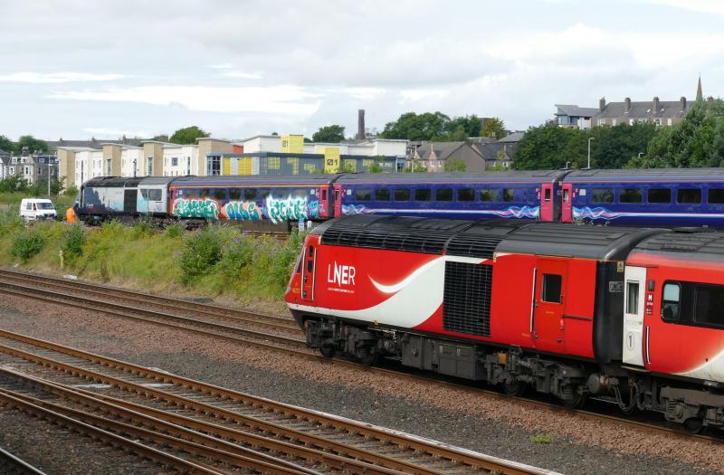Power Car 43146 and 1st Class coach covered in graffiti in Dundee Yard. : Photo of Power Car 43146 and 1st Class coach covered in graffiti in Dundee Yard.