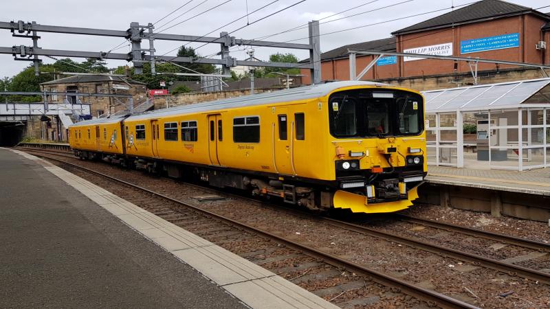 Photo of Class 950 950001 passing Springburn Station on the 02/08/19