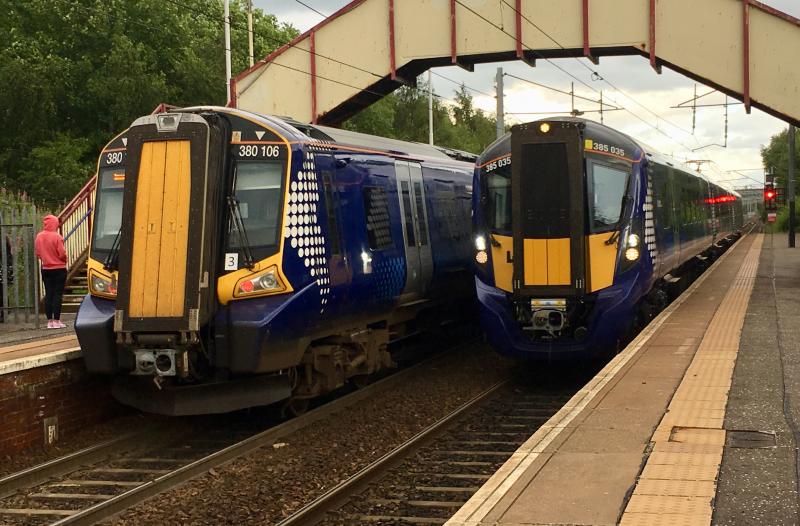New Meets... Relatively New: ScotRail Class 380 380106 on an all stops service from Glasgow to Edinburgh, passes a Class 385 385035 on a limited stopper express service from Edinburgh to Glasgow. Photo of New Meets... Relatively New