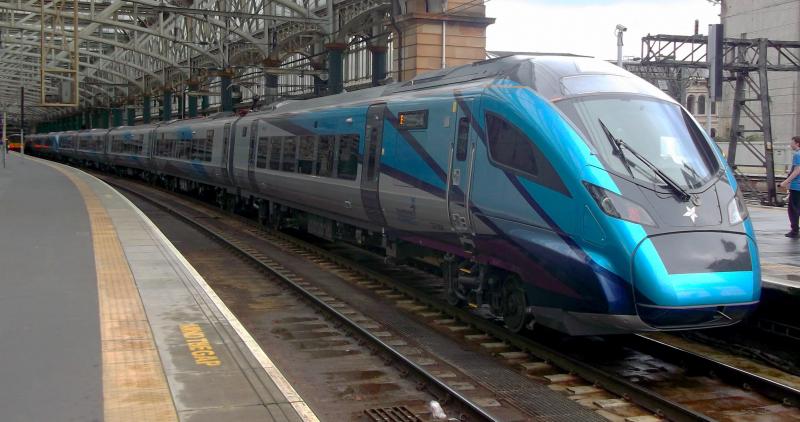 397004 at Glasgow Central: TPE Nova 1 397004 leads classmate 397003 waiting at Glasgow Central with a Training and mileage accumulation run to Crewe on Monday 12th August 2019. Photo of 397004 at Glasgow Central