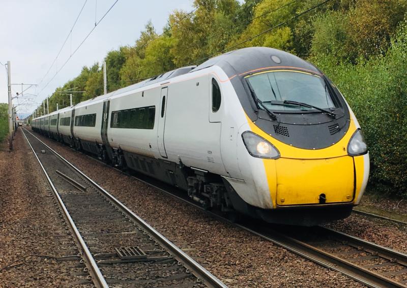 Plaindolino (Almost): Nearly full debranded Class 390 no. 390122 heads south bound past Shieldmuir for London Euston. The only part of the unit still in Virgin branding was the rear of the train. Photo of Plaindolino (Almost)