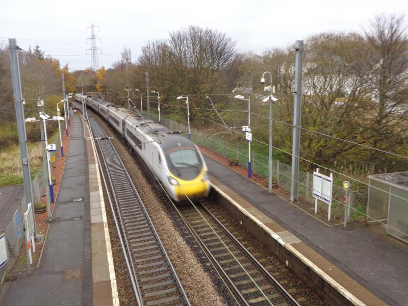 390 passes Curriehill: 1052 EDI to EUS on a dull 16 November 2019 Photo of 390 passes Curriehill