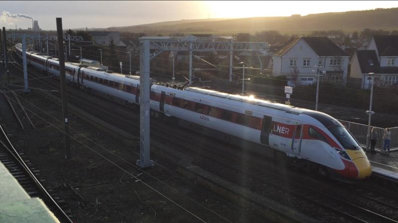 A new dawn: The first ever passenger service to call at the newly completed platform 2 at Dunbar is LNER Azuma 801209 forming the 1S03 08:45 Newcastle - Edinburgh on the first day of the new timetable, 15th December 2019. Photo of A new dawn