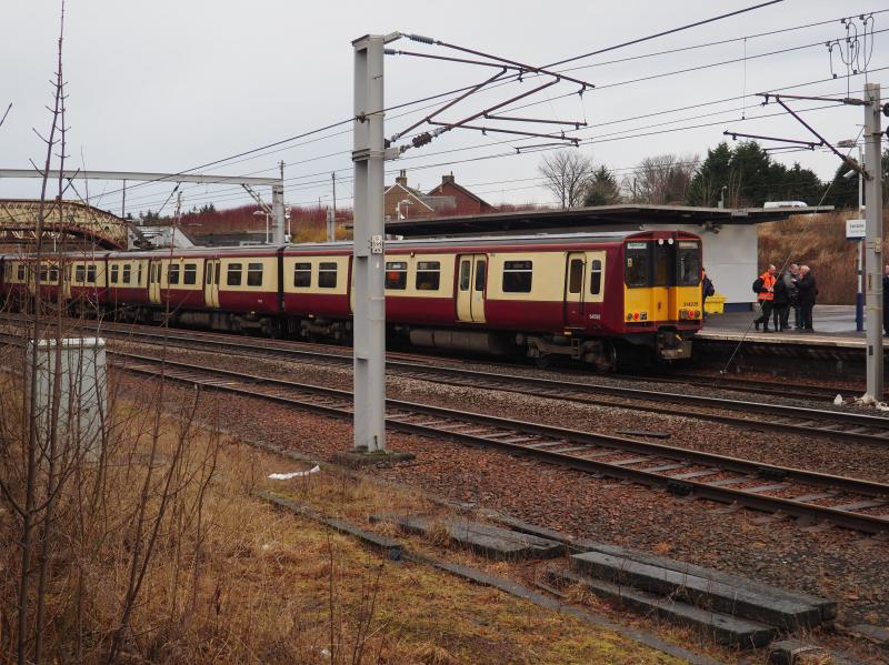 Class 314 farewell trip at Carstairs: Plenty of time to leave the station and get a photograph over the wall, clear of the crowds! Photo of Class 314 farewell trip at Carstairs