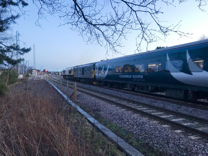 66706 73968: 66706 leading 73968 out of Aviemore, 1S25 northbound highland sleeper, 0830 17Jan20. Photo of 66706 73968