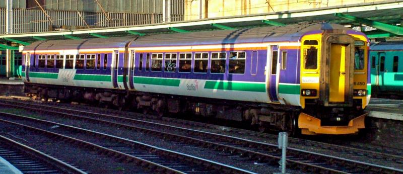 156450 at Carlisle: Wearing the First Scot-Rail livery, 156450 leaves Carlisle with a service to Newcastle, from Stranraer on 24th December 2005 Photo of 156450 at Carlisle