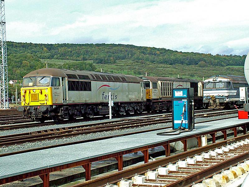 56069 at Metz: EWS 56069 transferred to Fertis in France as part of the TGV Est Construction waits at the Metz stabling sidings
along with 58022 and SNCF 67622 on 2Oth October 2006 Photo of 56069 at Metz
