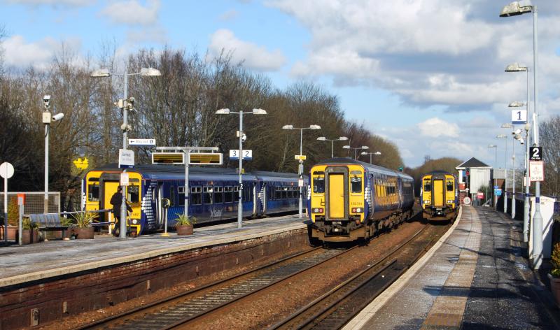 1 in each Road: 156462 in the bay platform. 156514 on a Kilmarnock to Glasgow service & 156501 arriving on a Glasgow Central to Kilmarnock Service Photo of 1 in each Road