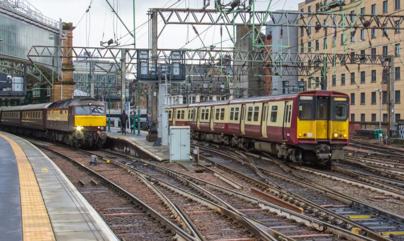 314210: 314210 passes 57601 as it departs Glasgow Central on 06/12/2019 Photo of 314210