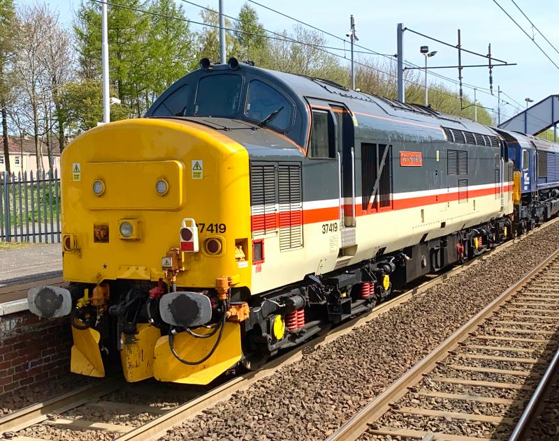 Tractor Trailer: Bound for Carlisle Kingmoor, Intercity Mainline liveried DRS Class 37 no. 37419 Carl Haviland trails dead behind Class 66 no. 66429, seen passing Holytown on 22/04/2020. Photo of Tractor Trailer