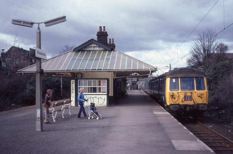 303085 at Shawlands: 303085 calls at Shawlands on a Cathcart Inner Circle service on 31 March 1979. The typical Cathcart District Railway building has since been demolished. Photo of 303085 at Shawlands