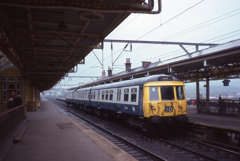 303041 at Dumbarton Central: 303041 on a service to Airdrie at Dumbarton Central, 12 May 1979 Photo of 303041 at Dumbarton Central