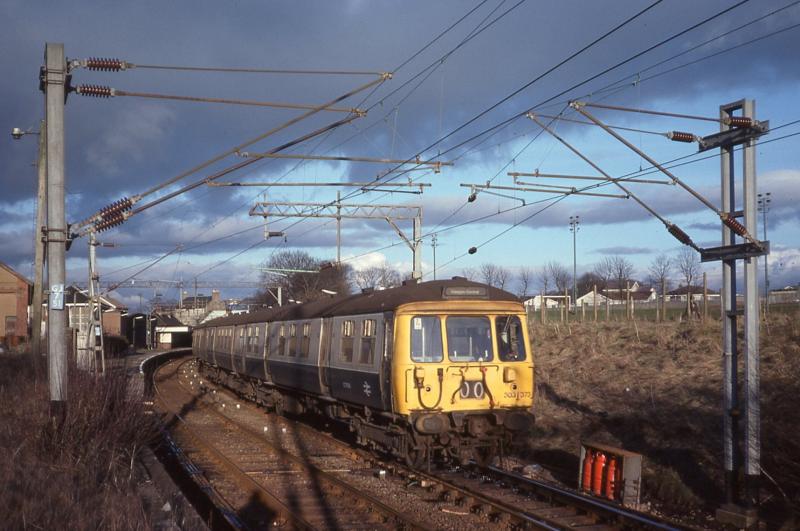 303073 at Neilston: 303073 runs into the reversing siding at Neilston, 10 March 1980. Photo of 303073 at Neilston