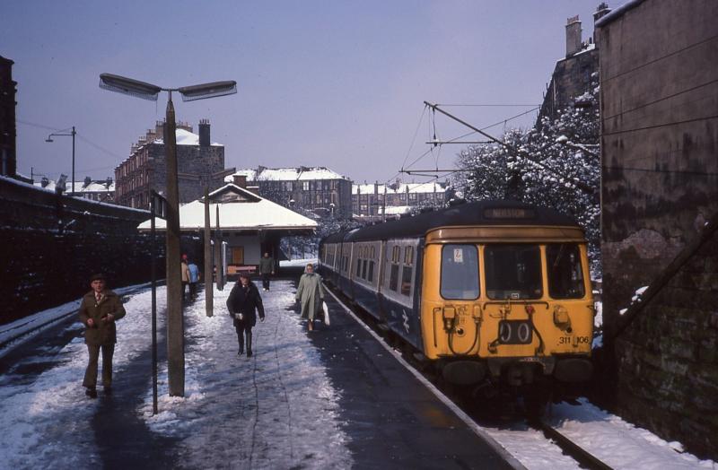 311106 at Queens Park: 311106 on a Neilston working at Queens Park on 22 March 1980 - still not too late for snow! Photo of 311106 at Queens Park