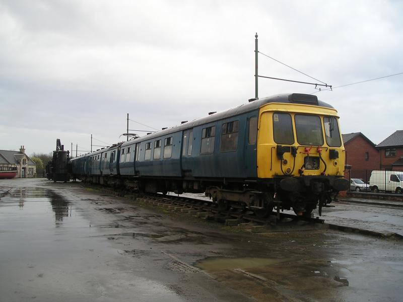 311103 at Summerlee Mid 2000s: 311103 sits at Summerlee following its repaint in BR Blue. The windows on the museum side were left uncovered. Photo of 311103 at Summerlee Mid 2000s
