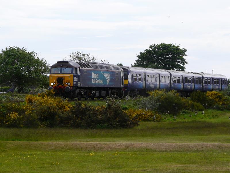 320302 being towed to Kilmarnock by 57301 on 25 May 2020: 57301 Goliath heads up the branch from Barassie towards Kilmarnock with 320302 in tow ex Yoker on 25 May 2020.
Photo of 320302 being towed to Kilmarnock by 57301 on 25 May 2020
