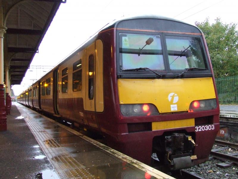 320303 on the rear of the 16.57 to High Street in Platform 1 at Milngavie: Photo of 320303 on the rear of the 16.57 to High Street in Platform 1 at Milngavie