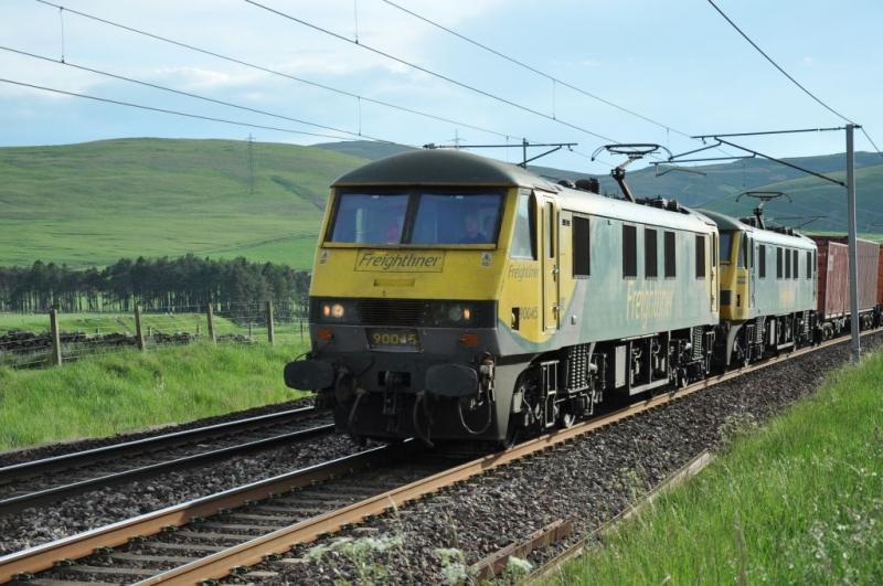 Crawford double-header: Class 90 locos 90045 and 90041 double-head a container train south on the WCML near Crawford on the evening of 17th June 2020. Photo of Crawford double-header
