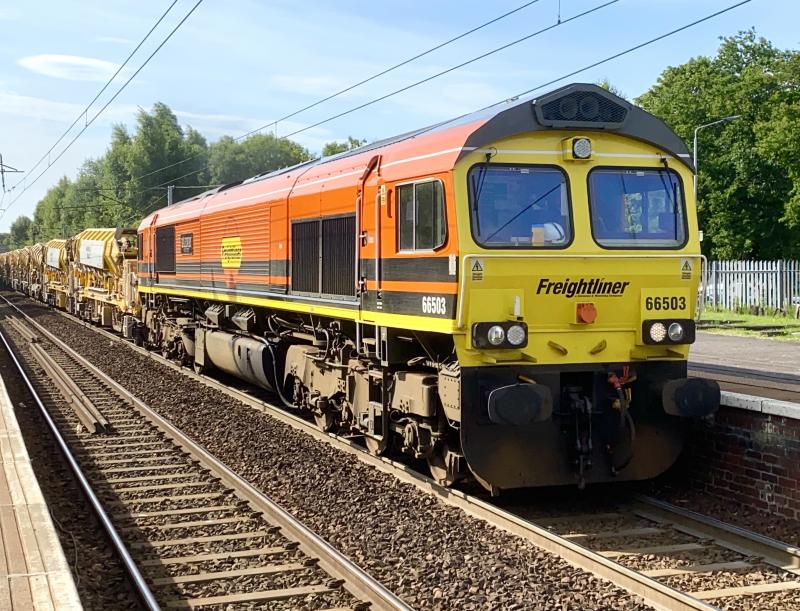 Orange is the new Green: Wearing the latest Freightliner branding of Orange and Black. 66503 leads 6K31 from Alloa to Millerhill through Holytown. Photo of Orange is the new Green