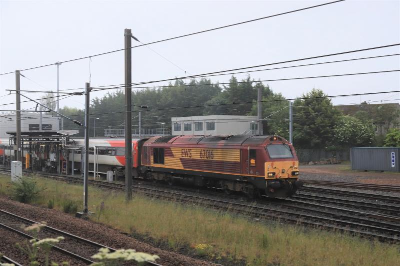 5E12: 67016 on 5E12 10.08 Craigentinny to Waverley leaving Craigentinny on 19/06/2020. 91115 on the rear Photo of 5E12