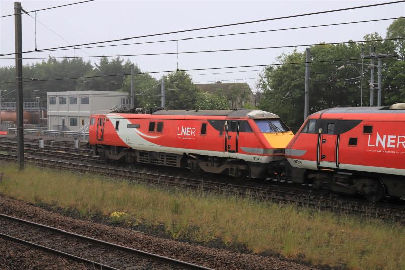 5E12: 91115 on the rear of 5E12 10.08 Craigentinny to Waverley leaving Craigentinny on 19/06/2020. 67016 leading, Photo of 5E12