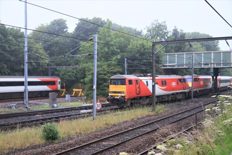 5E12: 91115 on the rear of 5E12 10.08 Craigentinny to Waverley leaving Craigentinny on 19/06/2020. 67016 leading, Photo of 5E12