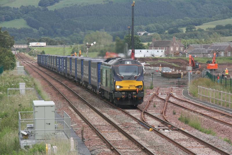 4D47 68016 Blackford 29/06/20: 68016 accelerates away from a signal stop at Blackford with the Inverness to Mossend Tesco train; 4 early Photo of 4D47 68016 Blackford 29/06/20