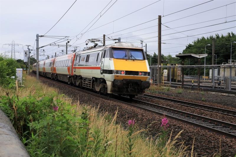1E12: 91119 on the rear of 1E12 11.00 Edinburgh to Kings Cross passing Craigentinny Depot on 03/07/2020 Photo of 1E12