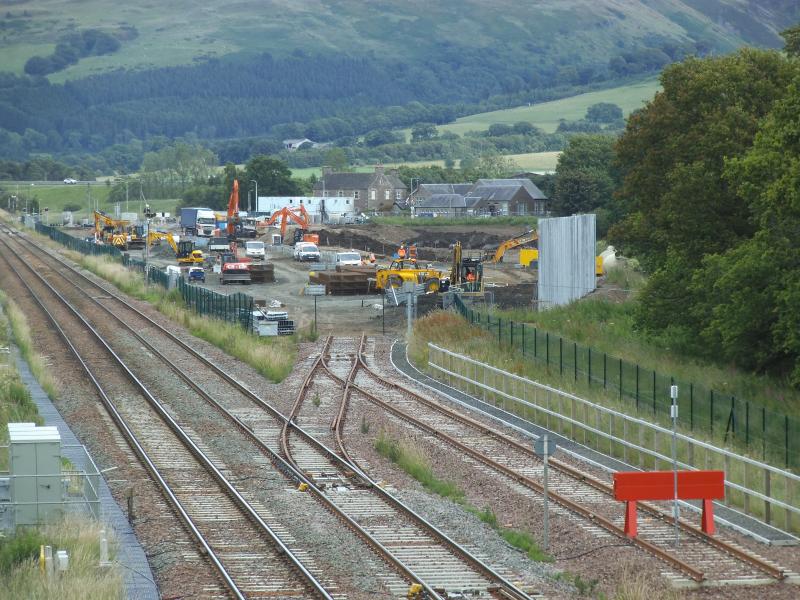 Highland Spring Yard, Blackford, 13/07/20: General view of the Highland Spring Yard works. The pile driver has gone and a line of tall steel posts has been erected on the right hand side of the picture. Photo of Highland Spring Yard, Blackford, 13/07/20