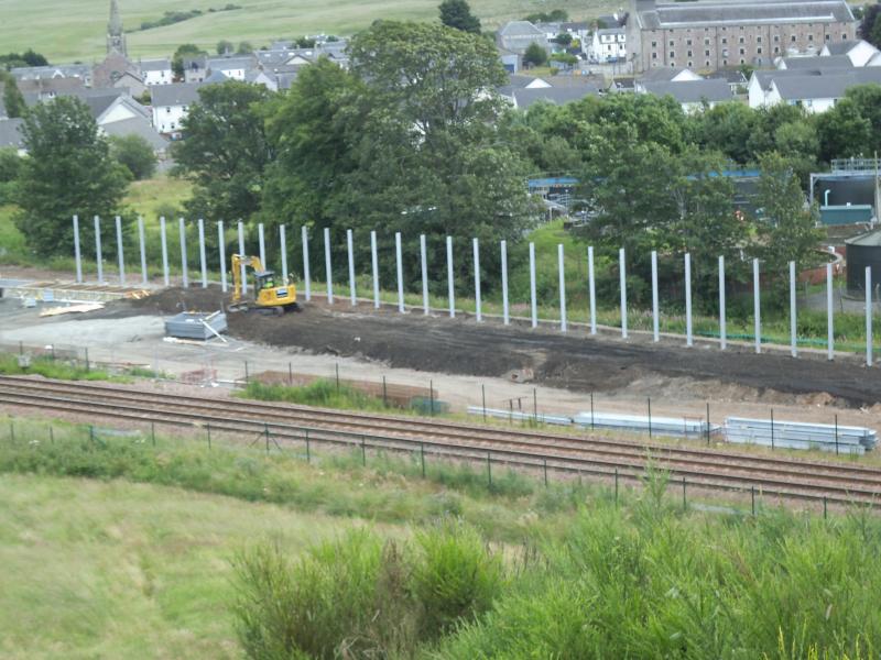 Highland Spring Yard, Blackford, 13/07/20: Close up of the line of tall steel posts erected at the back of the up end of the yard. Photo of Highland Spring Yard, Blackford, 13/07/20