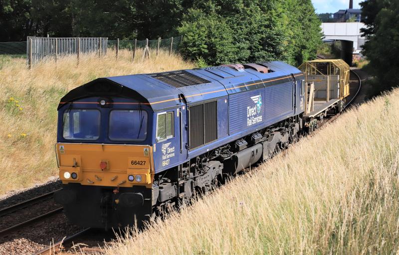 6Z74: 66427 on 6Z74 10.25 Millerhill to Wembley receptions 1-7 1 wagon from a CWR train code? passing Peffermill playing fields on 21/07/2020. Photo of 6Z74