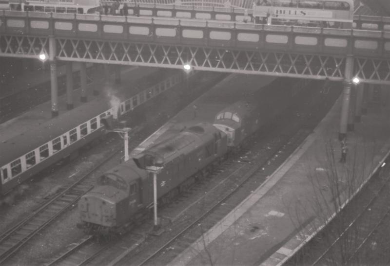 Queen Street 1982: A pair of class 37s, lead by 014, sitting in platform 3 with a West Highland line service, taken circa February 1982 Photo of Queen Street 1982