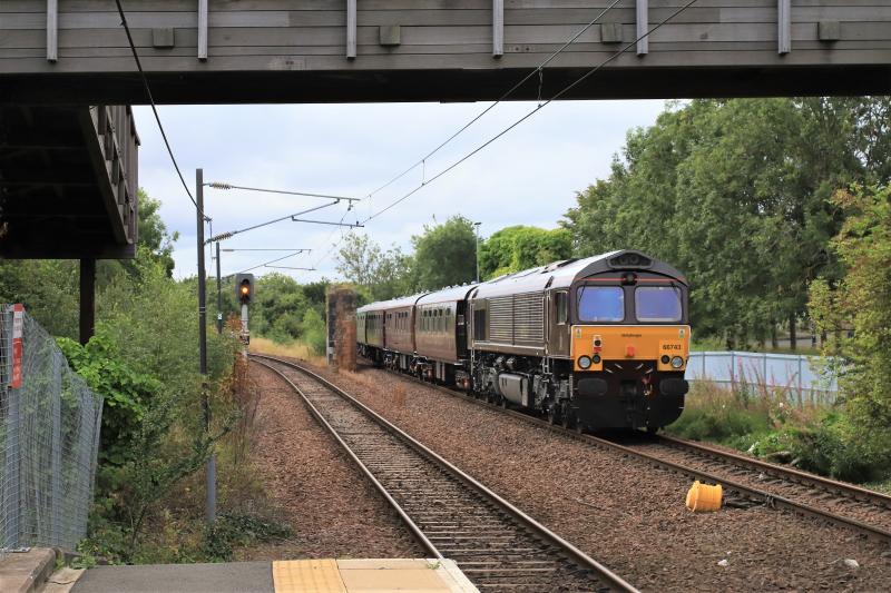 5D91: 66743 on the rear 66746 leading on 5D91 10.03 Edinburgh to Hamilton passing between the remains of an overbridge for the Lothian Lines at Brunstane on 23/08/2020 Photo of 5D91