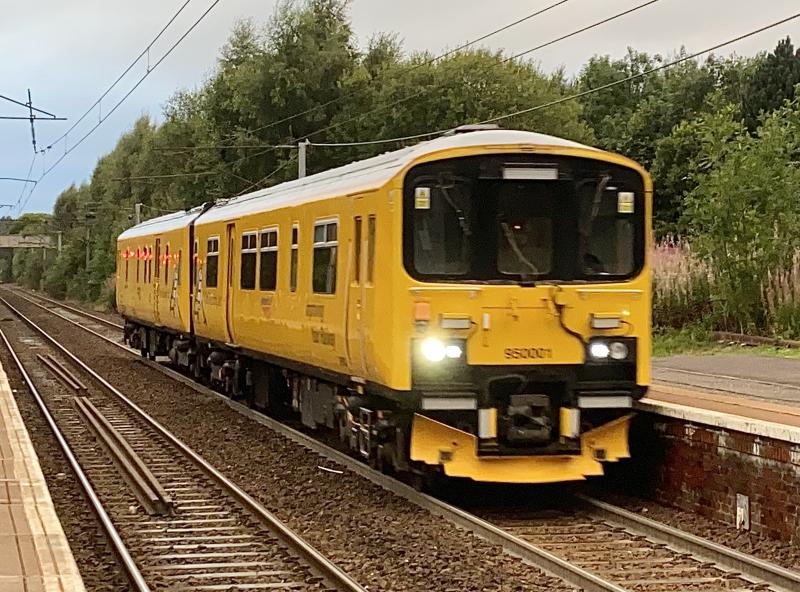 Sprinting Through : True to the Sprinter family name, 950001 is seen approaching Holytown at high speed. Lack of light and a fast moving train aren’t the best circumstances for photography. Photo of Sprinting Through