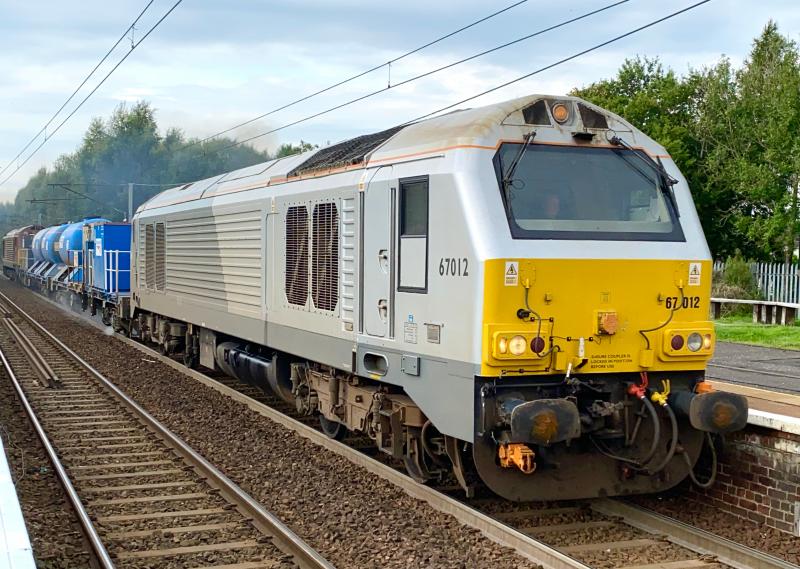 Skip Season: One of the few Scottish RHTT paths which are loco hauled is 3S93, as seen here with DB Cargo 67012, still in debranded Wrexham and Shropshire livery, with 67020 on the rear. Photo of Skip Season