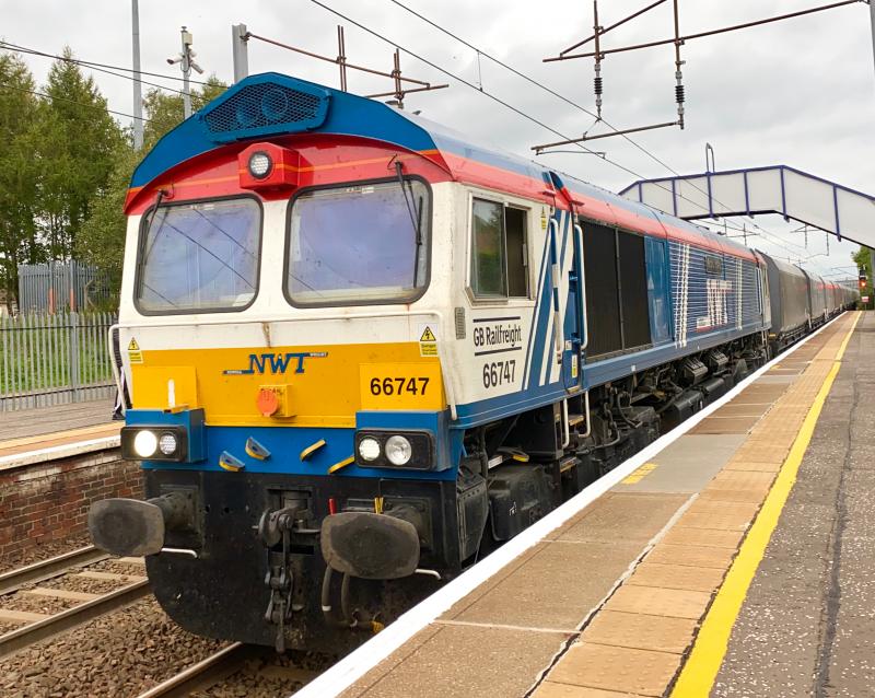 Made In Sheffield: GBRf Class 66, no. 66747 in special Newell & Wright livery is seen on the final leg of the journey passing Holytown on 6S05 running just over an hour early. Photo of Made In Sheffield