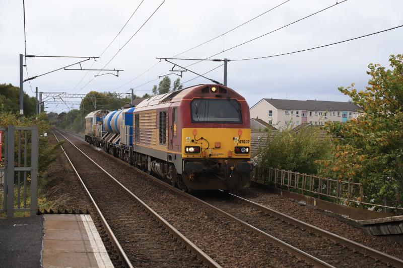 3S93: 67020 + 67012 on 3S93 06.46 Stirling to Slateford Depot approaching Wester Hailes station on 30/09/2020. Photo of 3S93