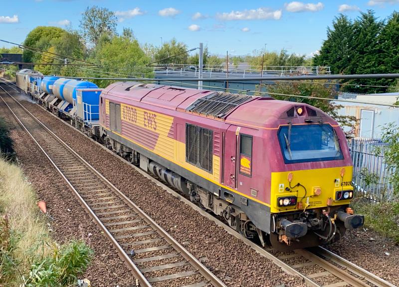 Underpass: A different type of shot from my usual ones, an overhead view from a small footbridge near Holytown sees 67020 with 67012 on the rear working 3S93 to Slateford Depot. Photo of Underpass