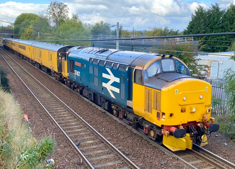 Another Overhead: Prior to my overhead shot of 3S93 a day after, 37407 is seen from the same angle on approach to Holytown, working 1Q75 from Mossend to Mossend. Photo of Another Overhead