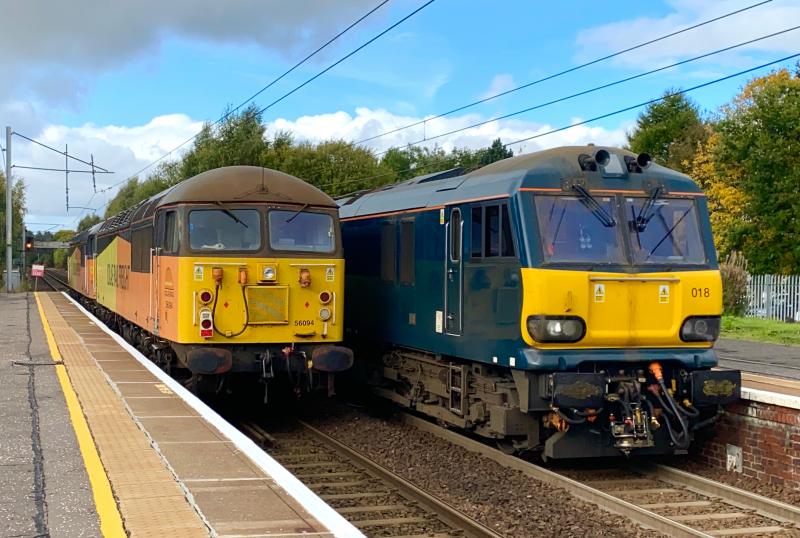 More Than Bargained For: The main subject loco is on the right, CS Class 92, 92018 working 0Z95 Polmadie to Polmadie, which was very nearly obscured by a pair of Colas 56s (56302 and 56094) working a LE move to Grangemouth. Photo of More Than Bargained For