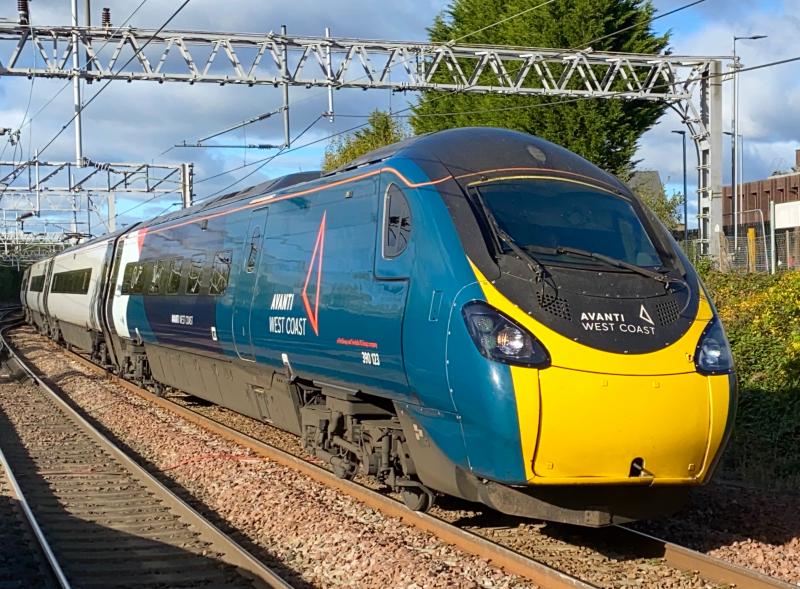 Still Got That Tilt: Avanti West Coast Class 390, 390123 rounds the bend towards Motherwell platform 1, bound for Euston. Photo of Still Got That Tilt